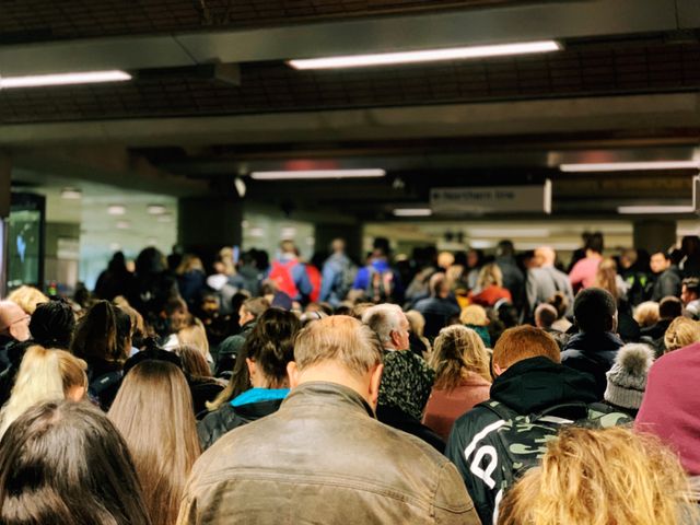 a crowded entrance to the Northern Line underground at London Bridge